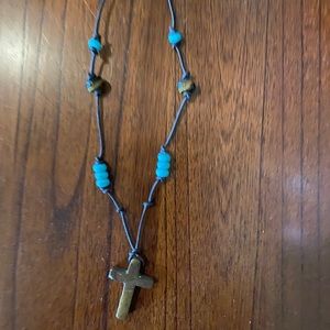 Leather strand cross necklace
